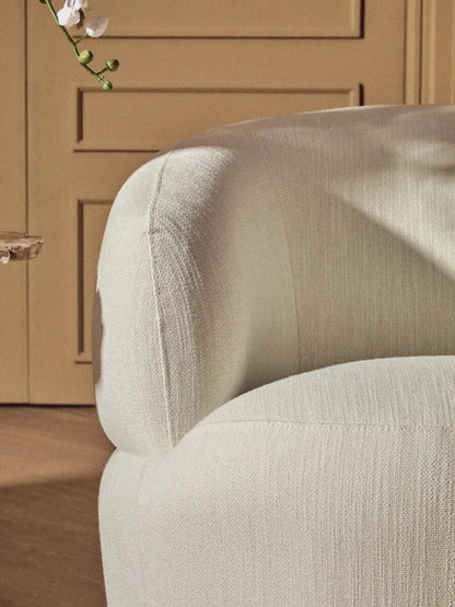 Bordo Textured Cream Curved Swivel Chair