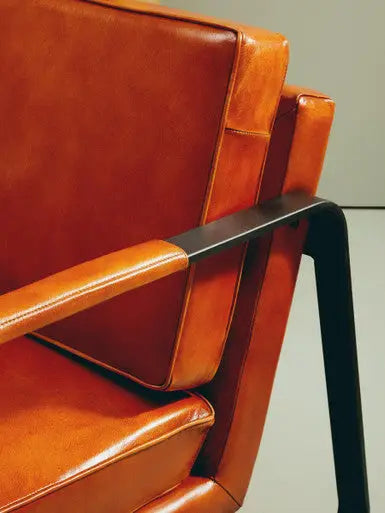 Buffalo Tan Leather Armchair with Curved Black Iron Frame