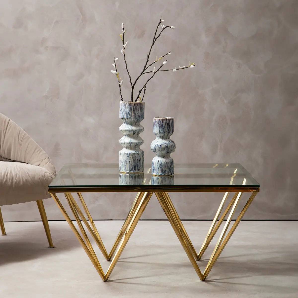 Gold Prismatic Square Coffee Table with Clear Glass Top and Pincer Style Legs, Allure