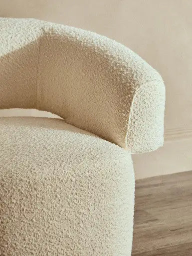 Ivory Boucle Curved Swivel Armchair | Oliveto