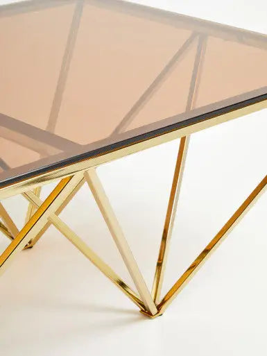 Red-Tinted Tempered Glass Top Coffee Table with Geometric Prismatic Champagne Metal Legs, Allure