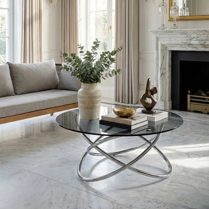 Smoked Grey Tempered Glass Top Round Coffee Table with Sculptural Stainless Steel Intertwined Base, Cassy